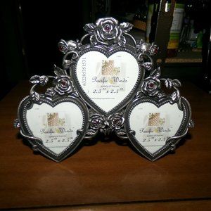 metal frame. Roses & hearts holds 3 pictures.